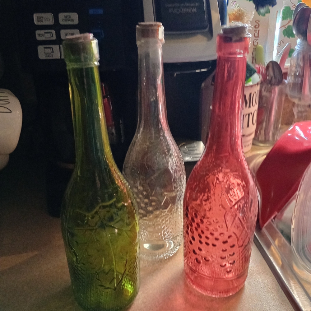Set of Three Decorative Glass Bottles